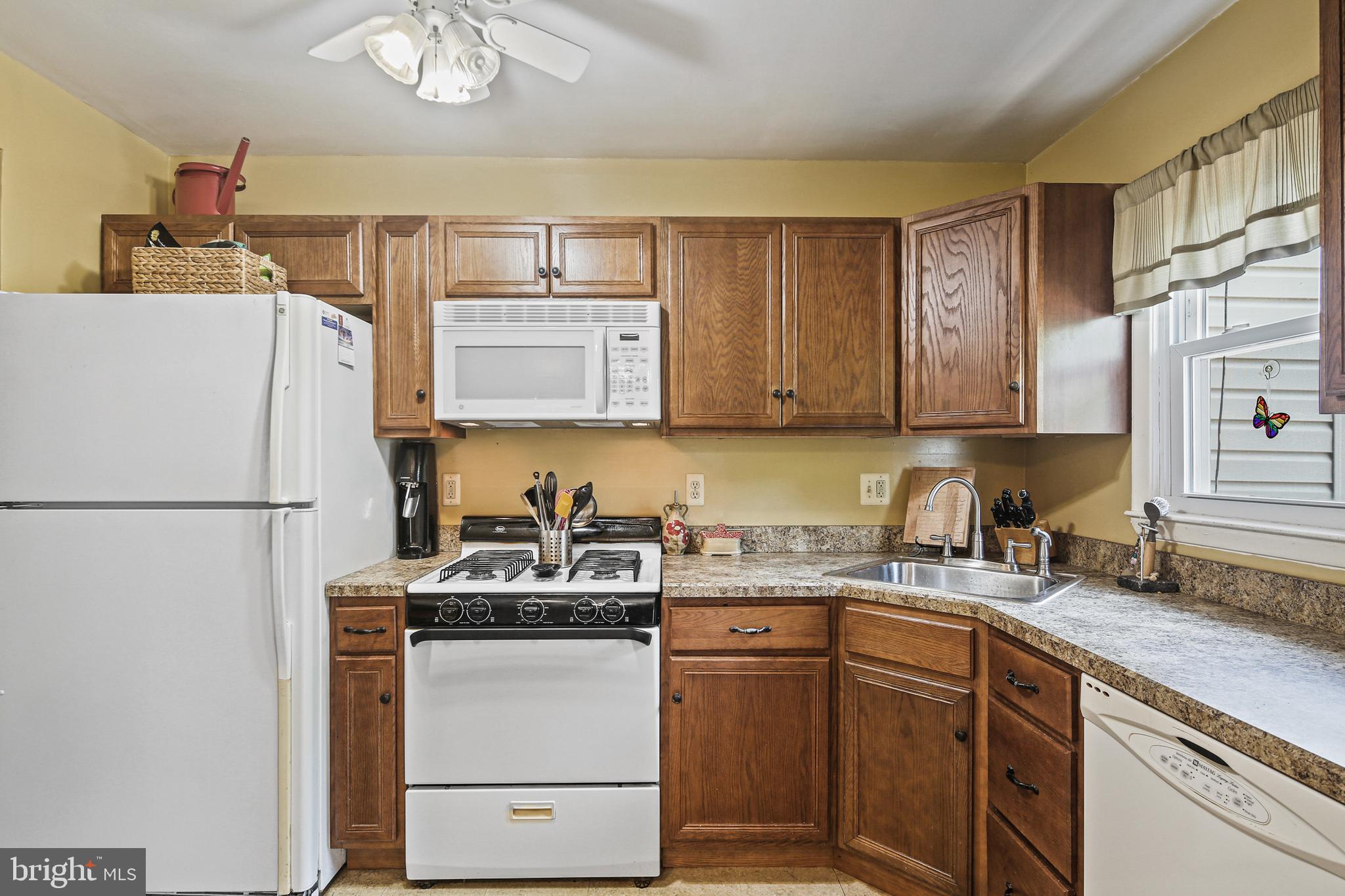 8302 Stillmeadow Road, Unit 1B Nottingham, MD 21236 - Photo 12 of 31 Refrigerator placed in with cabinets = space saver