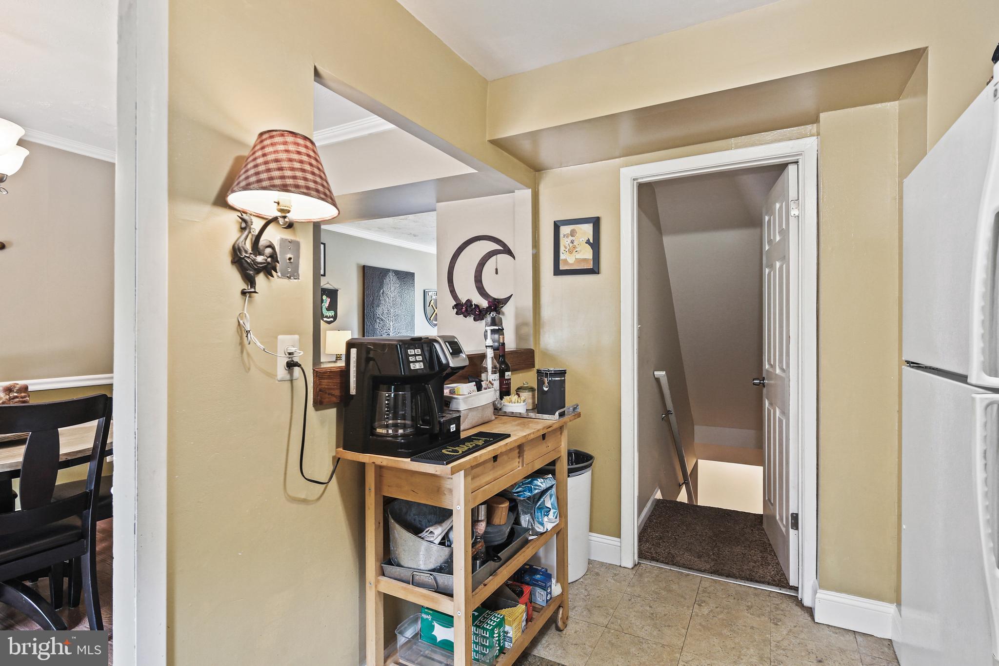 8302 Stillmeadow Road, Unit 1B Nottingham, MD 21236 - Photo 13 of 31 From kitchen to lower -level family room
