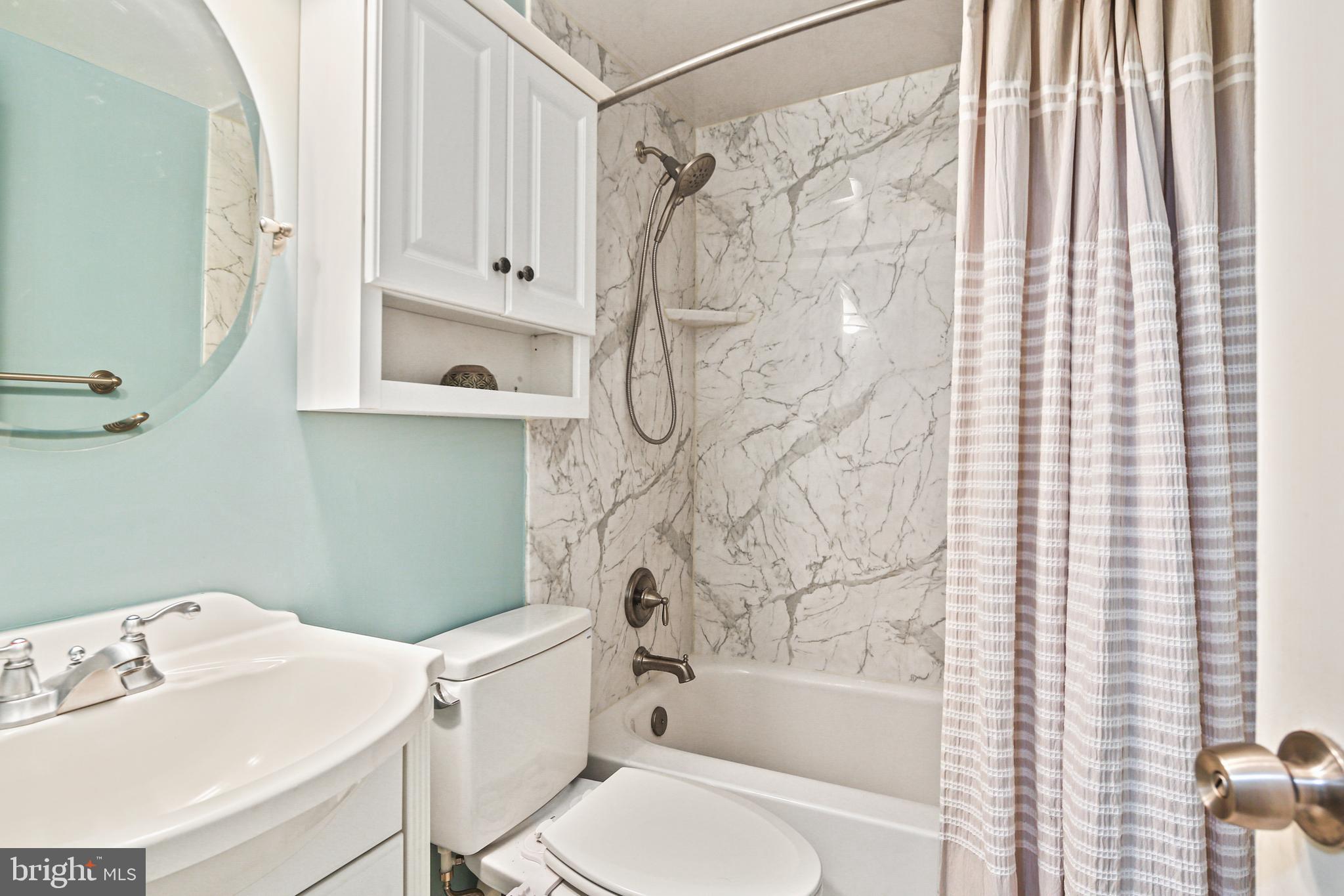 8302 Stillmeadow Road, Unit 1B Nottingham, MD 21236 - Photo 21 of 31 Hall bath- tub & shower