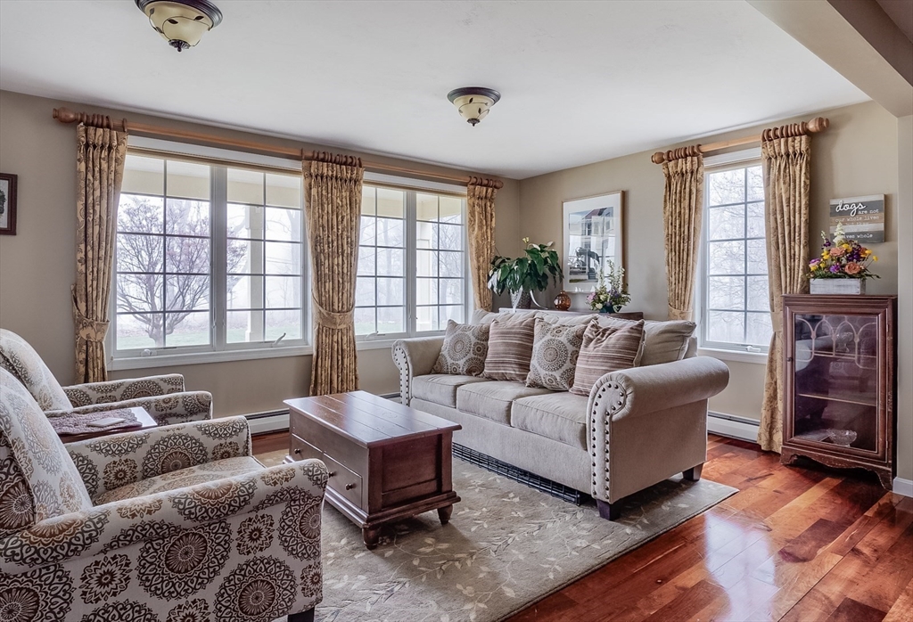 60 Emerald Road Rutland, MA 01543 - Photo 14 of 42 a living room with furniture and a window