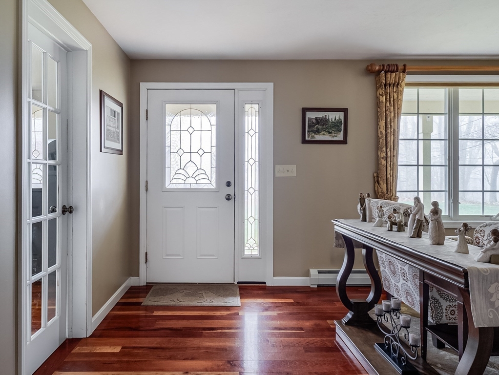 60 Emerald Road Rutland, MA 01543 - Photo 16 of 42 a view of a livingroom with wooden floor and a window