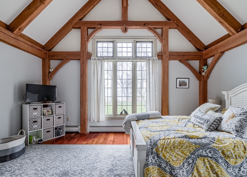 60 Emerald Road Rutland, MA 01543 - Photo 19 of 42 a bedroom with furniture and a window