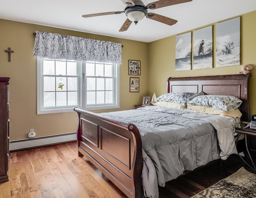 60 Emerald Road Rutland, MA 01543 - Photo 24 of 42 a bedroom with a bed and a window