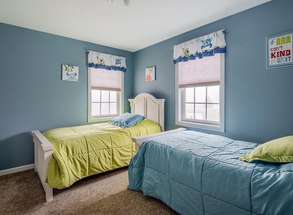 60 Emerald Road Rutland, MA 01543 - Photo 27 of 42 a bedroom with a bed and a window