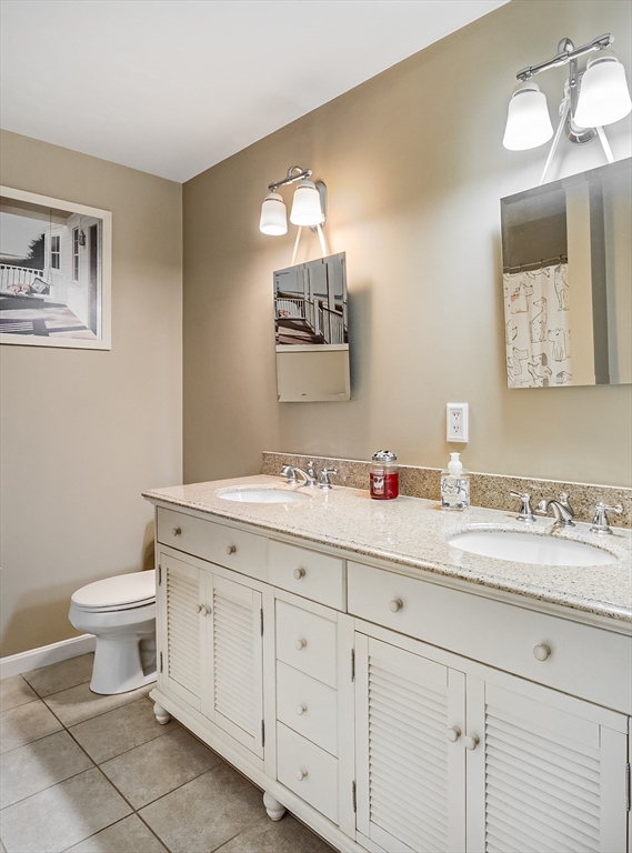 60 Emerald Road Rutland, MA 01543 - Photo 30 of 42 a bathroom with a toilet sink and mirror