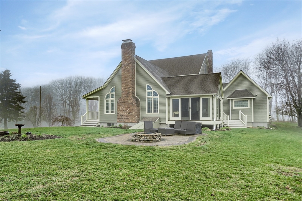 60 Emerald Road Rutland, MA 01543 - Photo 35 of 42 a front view of a house with a yard