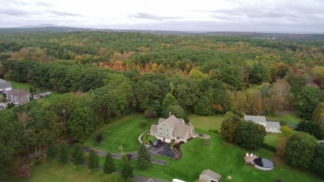 60 Emerald Road Rutland, MA 01543 - Photo 40 of 42 a aerial view of a house with a yard
