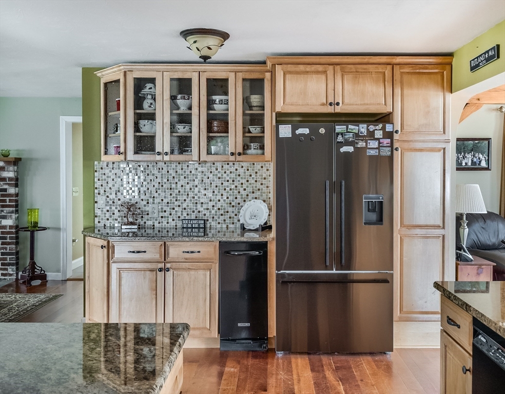 60 Emerald Road Rutland, MA 01543 - Photo 10 of 42 a kitchen with stainless steel appliances granite countertop a refrigerator and a sink