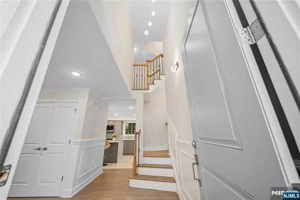 a view of a kitchen from the hallway