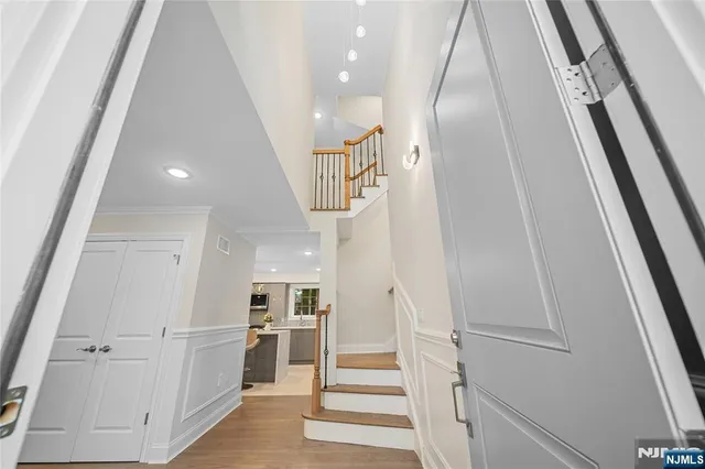 a view of a kitchen from the hallway