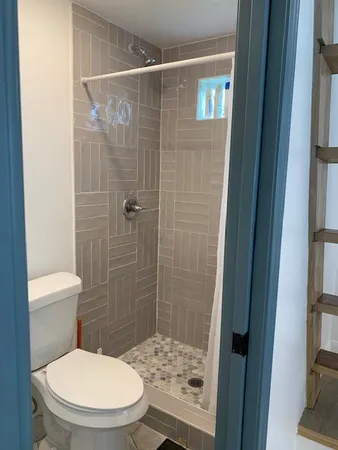 a view of a hallway with an entryway