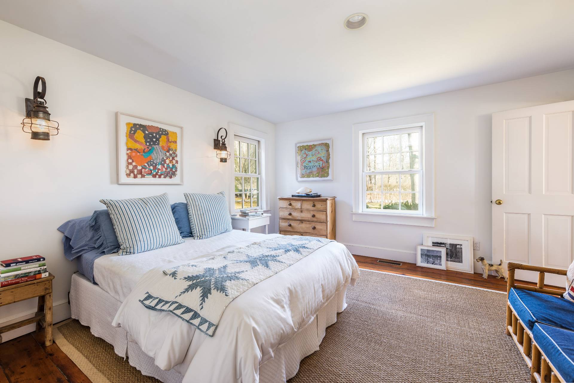 22 Barn Lane Bridgehampton, NY 11932 - Photo 12 of 18 a bedroom with a bed and a couch