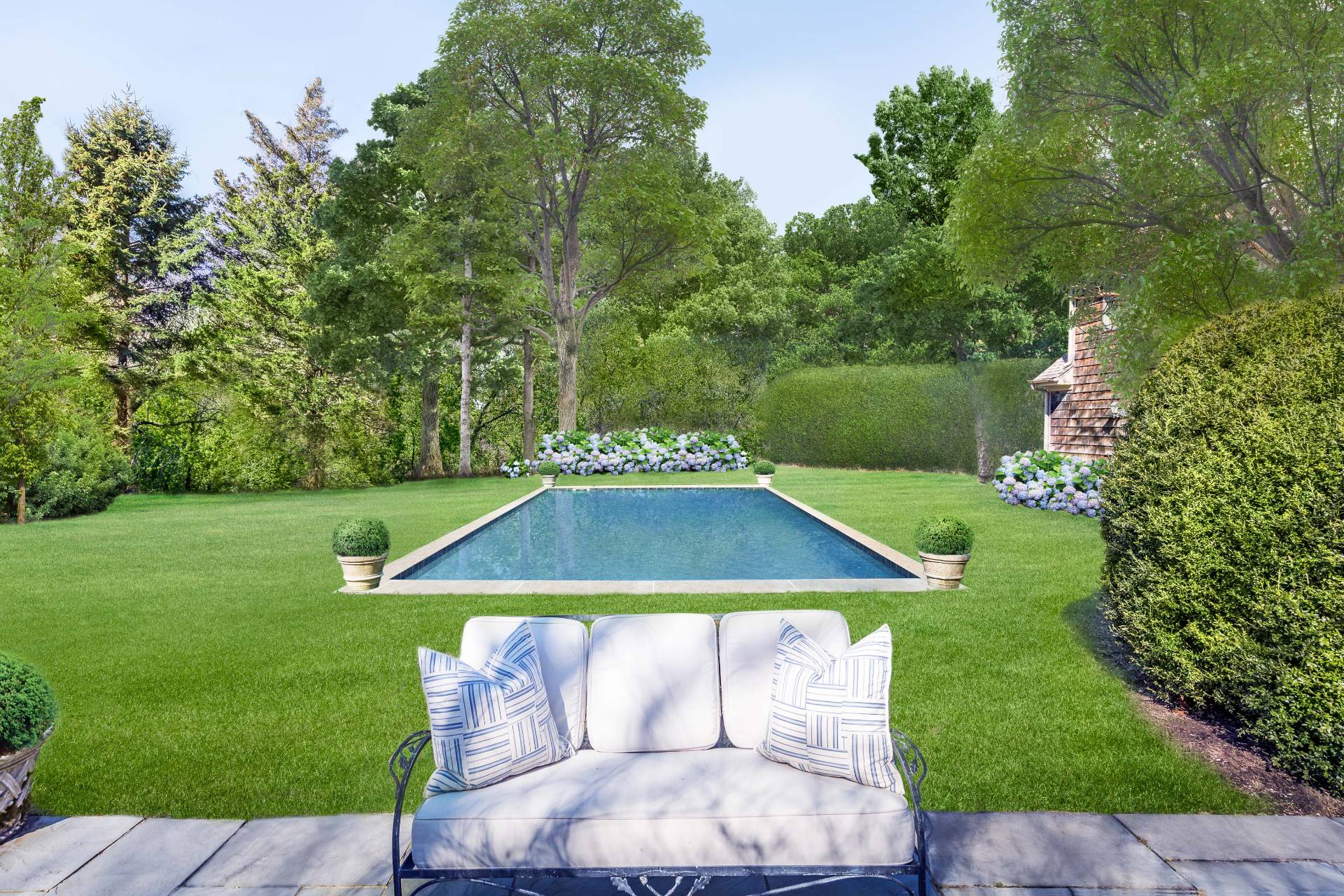 22 Barn Lane Bridgehampton, NY 11932 - Photo 15 of 18 a view of a backyard with a small cabin