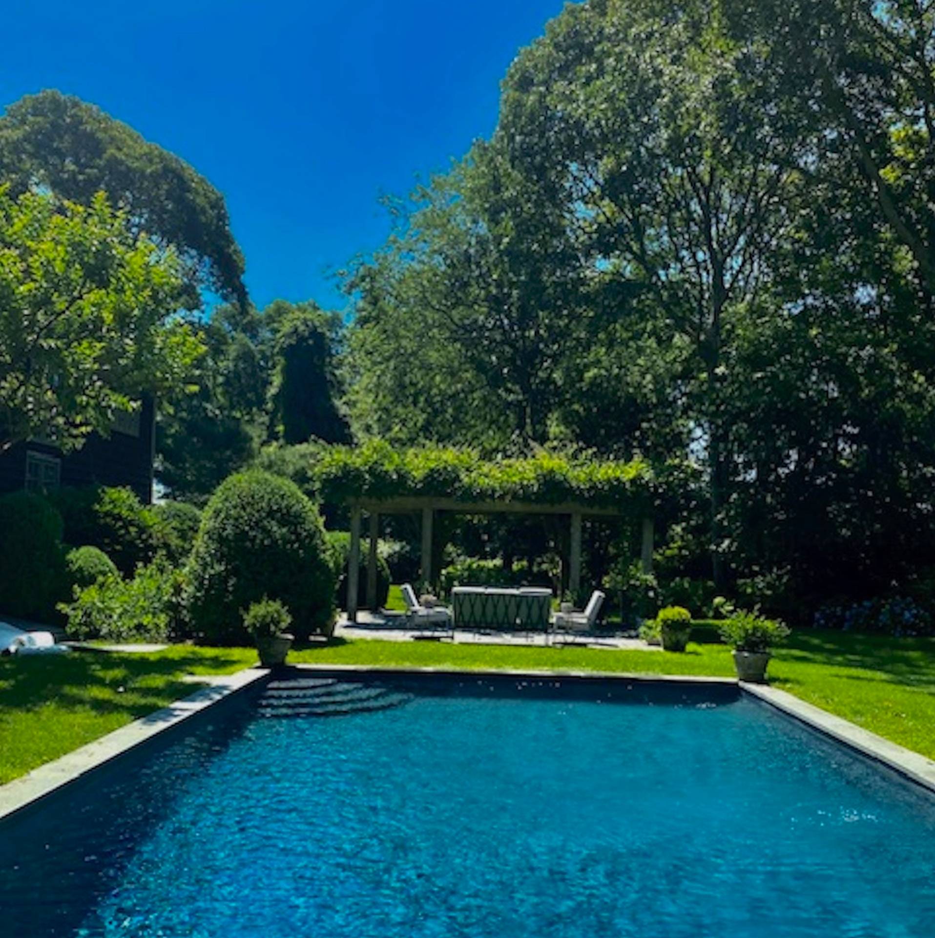 22 Barn Lane Bridgehampton, NY 11932 - Photo 16 of 18 a view of an outdoor space and swimming pool