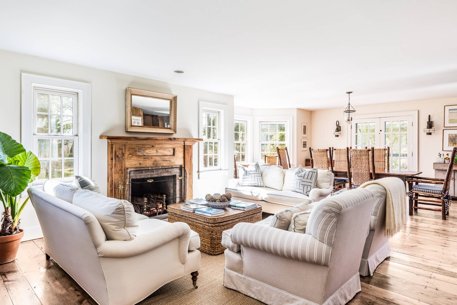22 Barn Lane Bridgehampton, NY 11932 - Photo 3 of 18 a living room with furniture fireplace and a large window