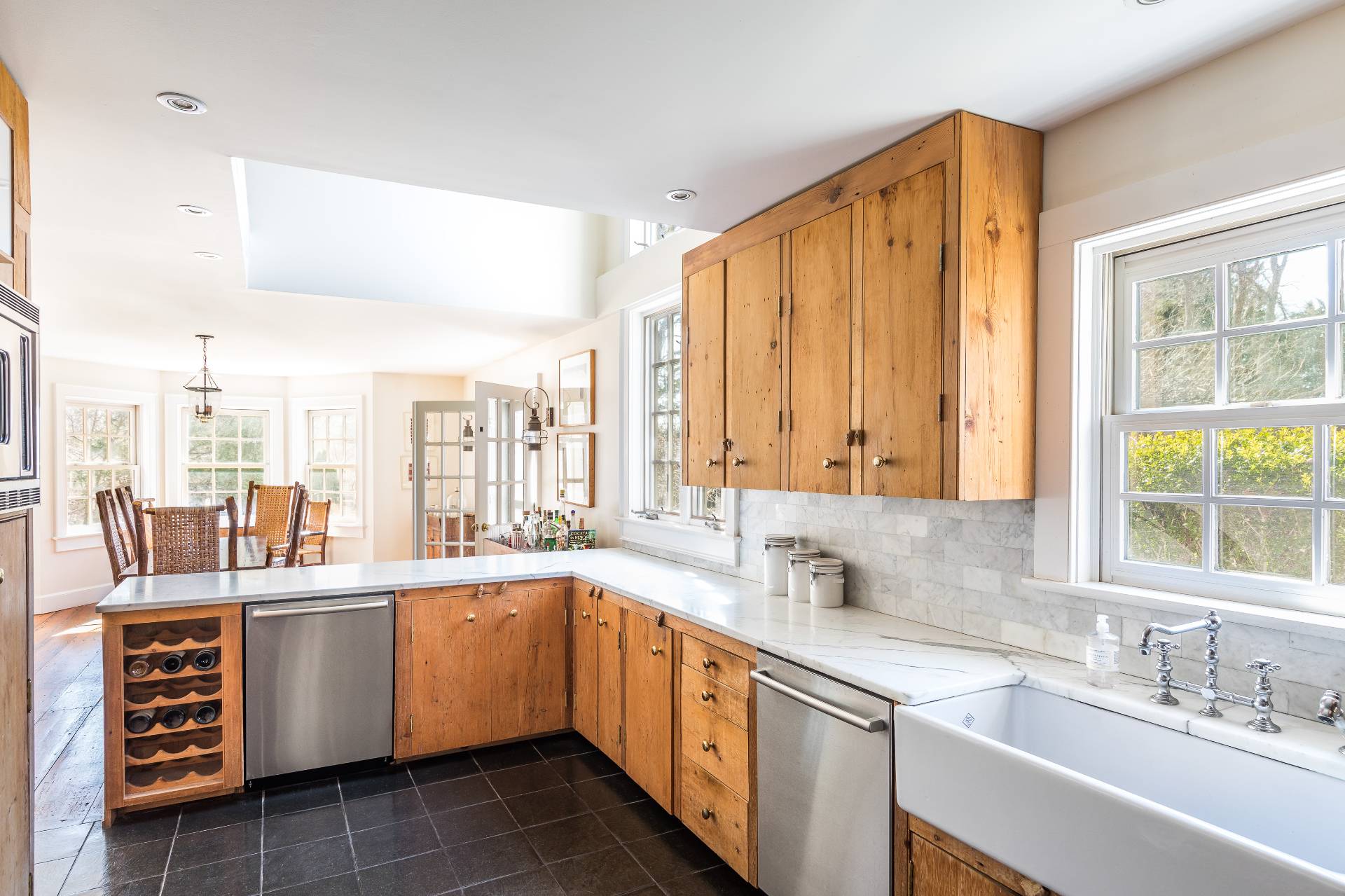 22 Barn Lane Bridgehampton, NY 11932 - Photo 5 of 18 a kitchen with a sink stove and cabinets