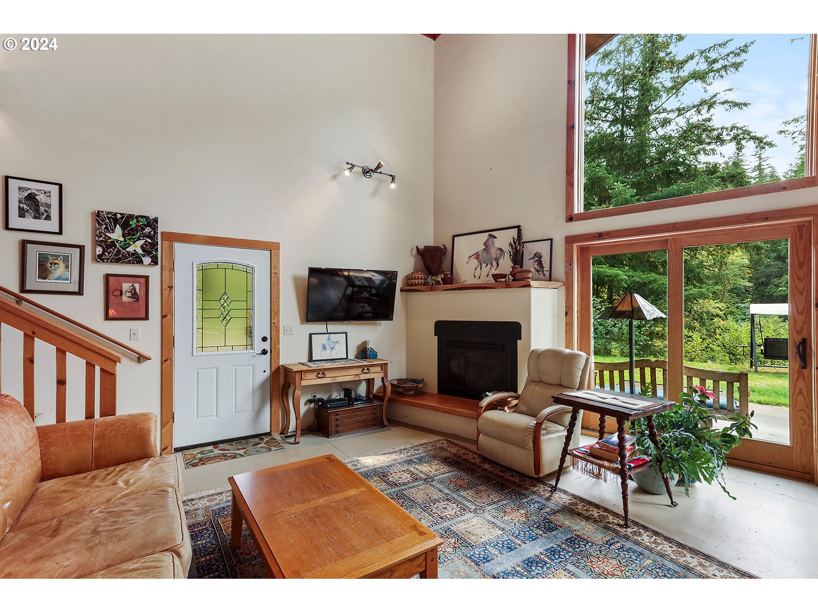 3610 Benton Road Hood River, OR 97031 - Photo 15 of 48 a living room with furniture and a fireplace