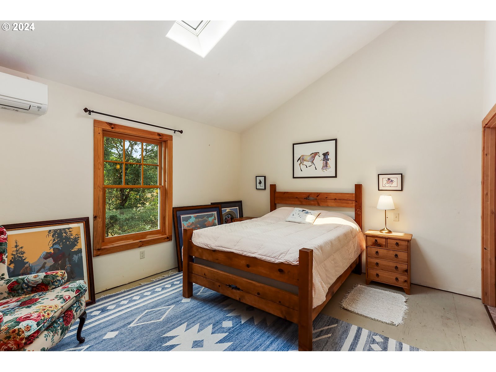 3610 Benton Road Hood River, OR 97031 - Photo 29 of 48 a bed sitting in a bedroom next to a window