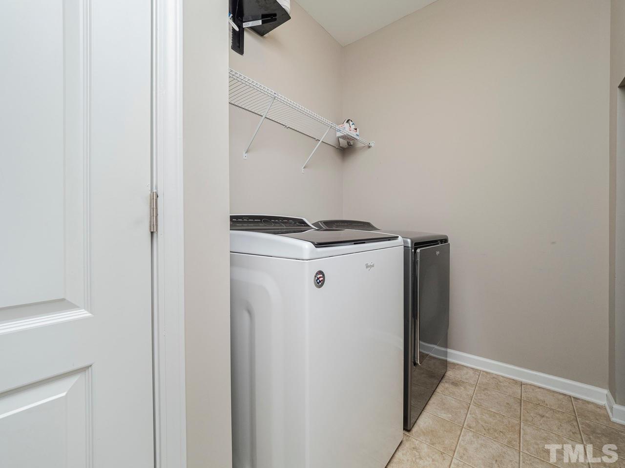 1001 Ileagnes Road Raleigh, NC 27603 - Photo 12 of 26 a utility room with dryer and washer