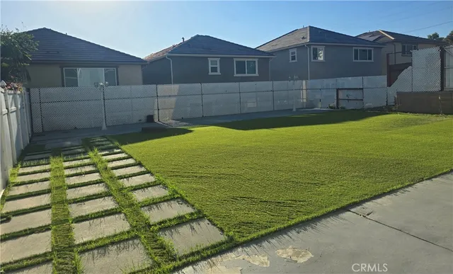 a view of a back yard of the house