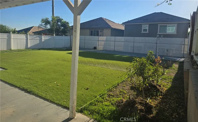 a view of back yard of the house
