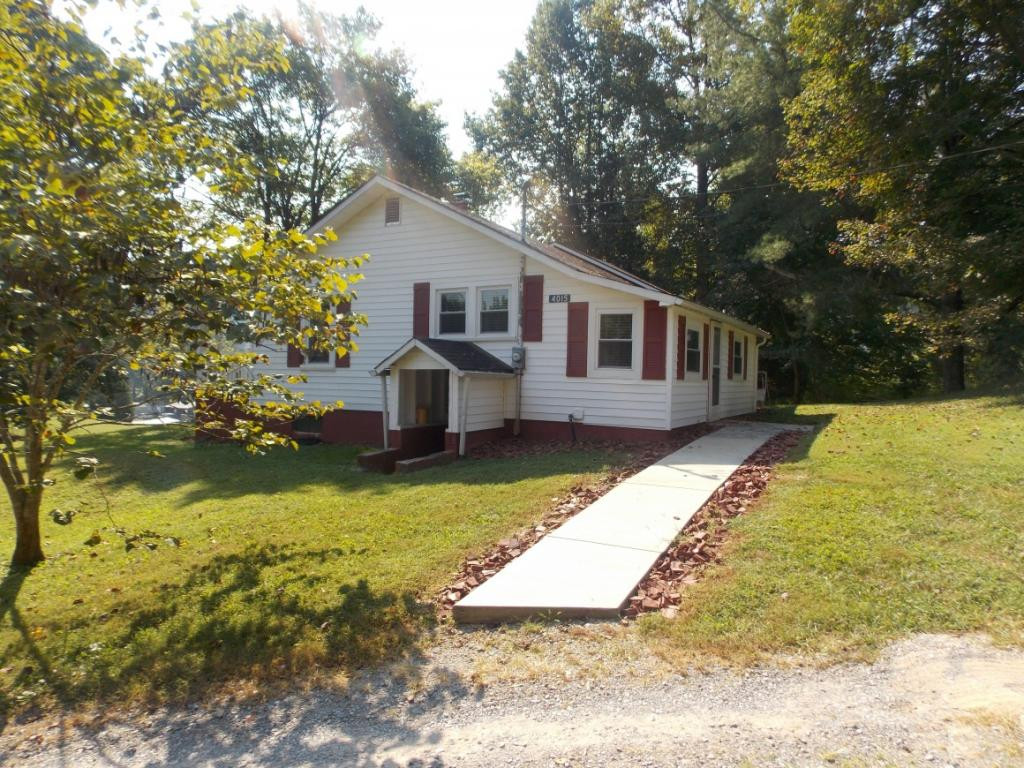 4015 Purchase Ridge Road Duffield, VA 24244 - Photo 7 of 26 Sidewalk to laundry room
