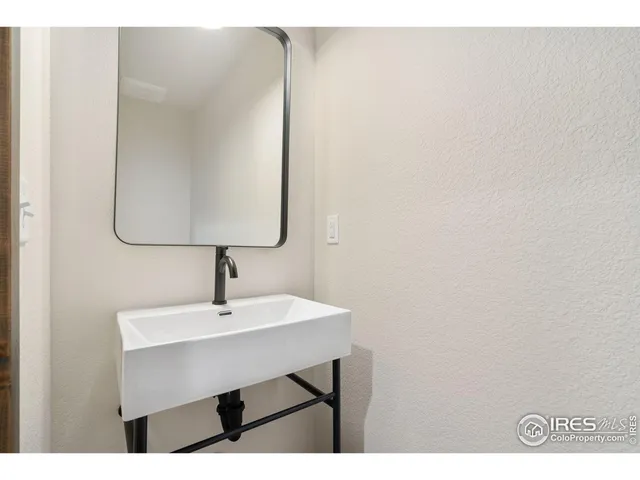 a view of a kitchen with a sink