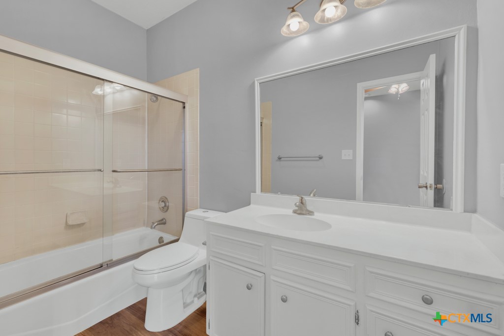 1013 Chestnut Street, Unit D San Marcos, TX 78666 - Photo 13 of 19 a bathroom with a sink toilet and shower