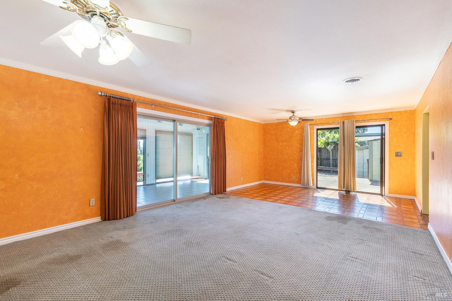 2236 West Hearn Avenue Santa Rosa, CA 95407 - Photo 15 of 56 a view of an empty room with window and chandelier fan