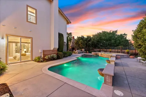a aerial view of a house with a big yard