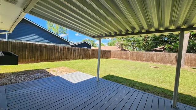 a view of a backyard with a garden