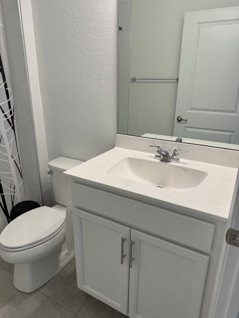 5133 Armina Place, Unit STUDIO Fort Pierce, FL 34951 - Photo 14 of 15 a bathroom with a sink toilet and mirror