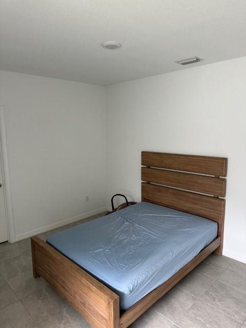 5133 Armina Place, Unit STUDIO Fort Pierce, FL 34951 - Photo 10 of 15 a room with a bed and a table