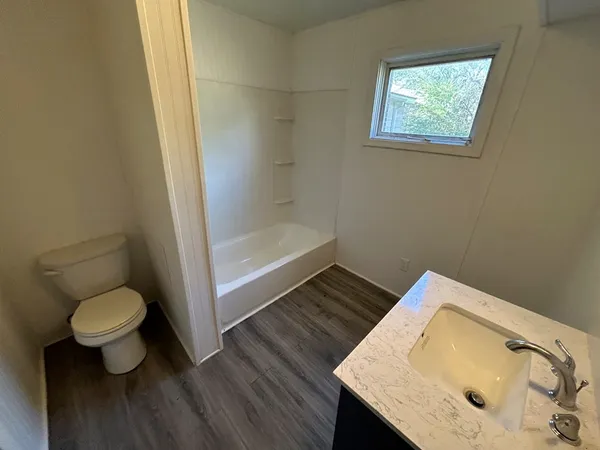 a bathroom with a sink and a toilet