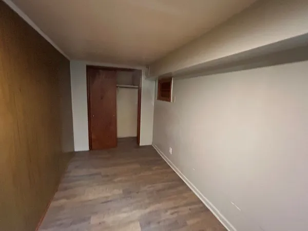 a view of hallway with an empty room