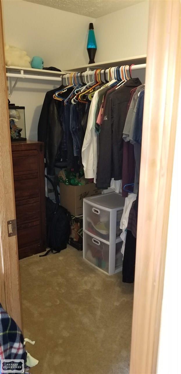 13847 Masters Road Allenton, MI 48002 - Photo 25 of 37 Bedroom Walk-in Closet