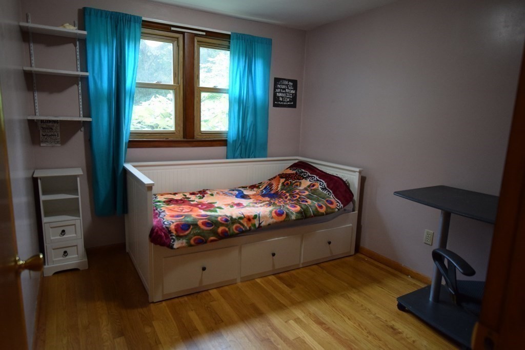 69 Deerfield Road Sharon, MA 02067 - Photo 8 of 12 a living room with furniture and a window