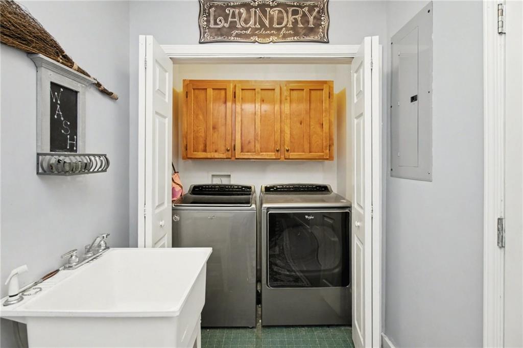 1932 River Bend Road Southwest Plainville, GA 30733 - Photo 13 of 30 a kitchen with a stove and a refrigerator