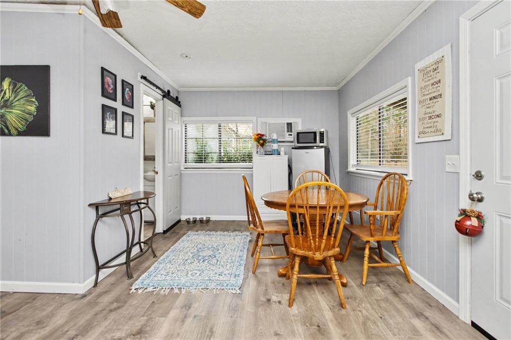 1932 River Bend Road Southwest Plainville, GA 30733 - Photo 24 of 30 a view of a dining room with furniture and chandelier