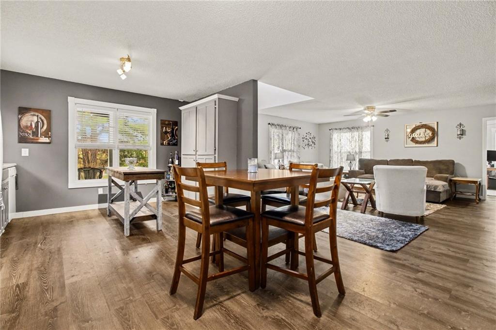 1932 River Bend Road Southwest Plainville, GA 30733 - Photo 7 of 30 a view of a dining room with furniture window and wooden floor