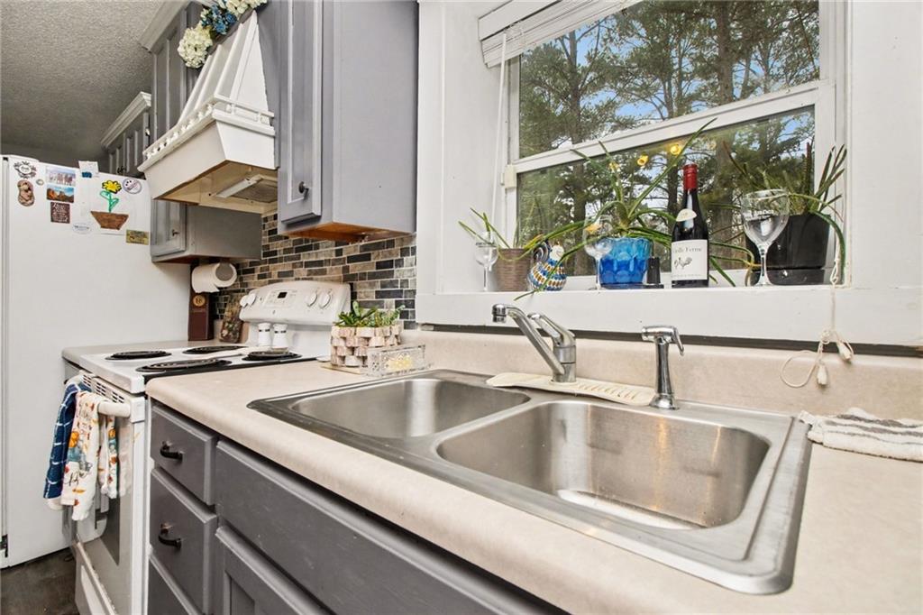 1932 River Bend Road Southwest Plainville, GA 30733 - Photo 9 of 30 a close view of sink and tap
