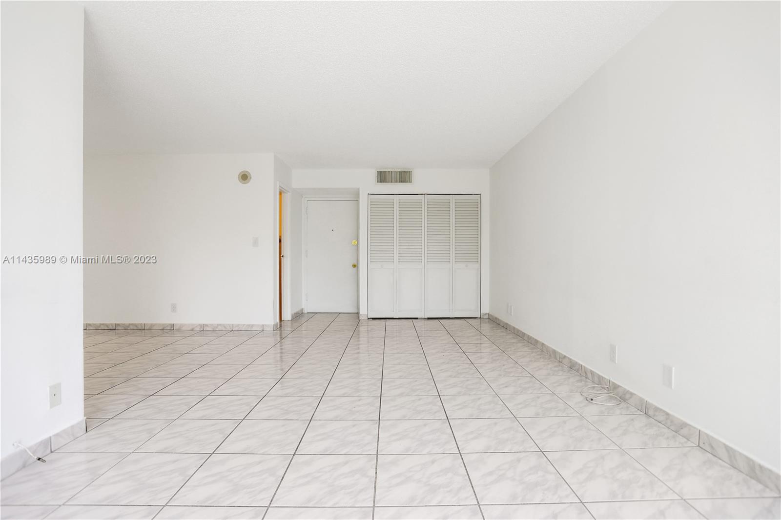17021 North Bay Road, Unit 418 Sunny Isles Beach, FL 33160 - Photo 11 of 43 an empty room with cabinet