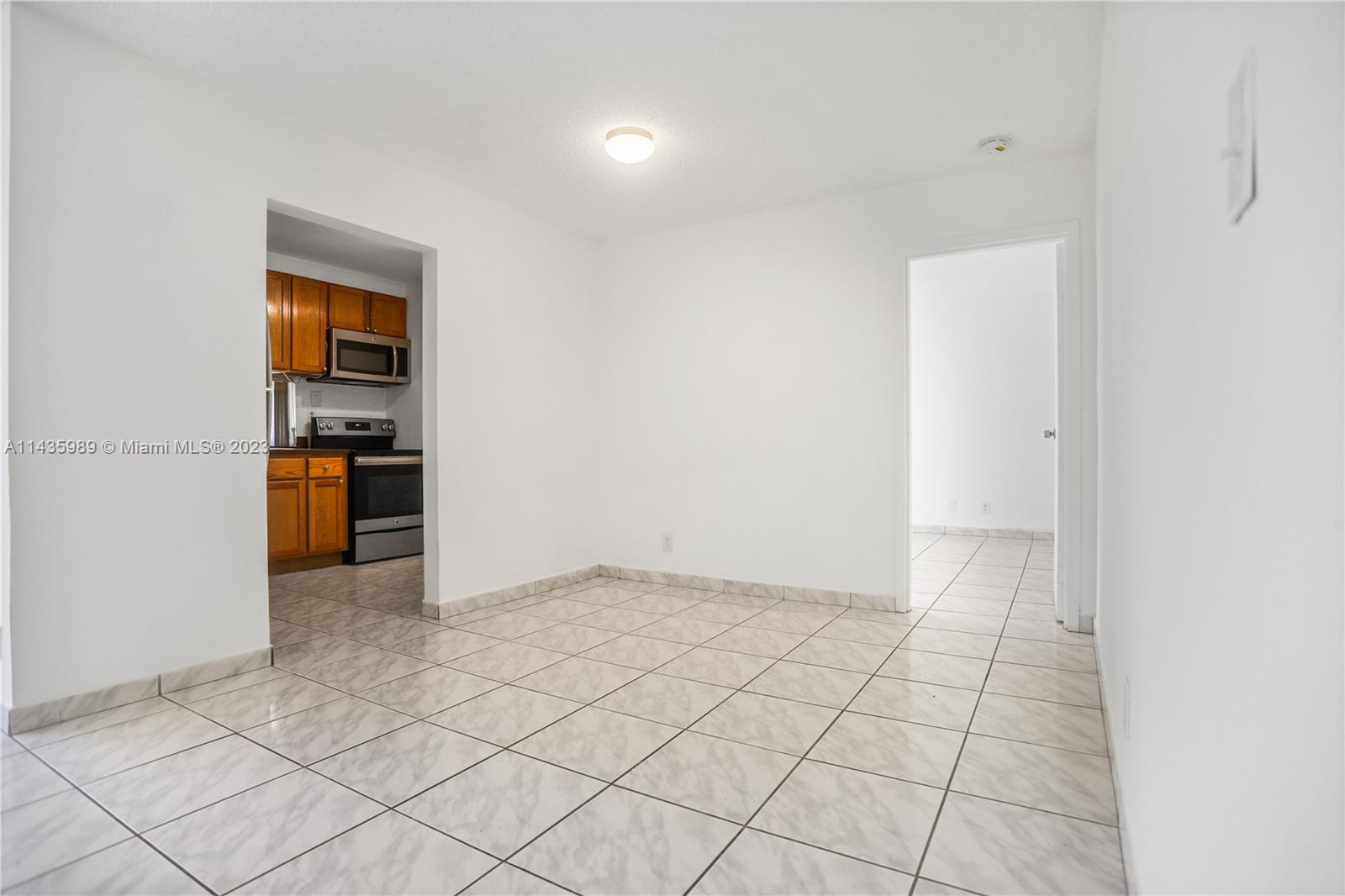 17021 North Bay Road, Unit 418 Sunny Isles Beach, FL 33160 - Photo 12 of 43 an empty room with shelves