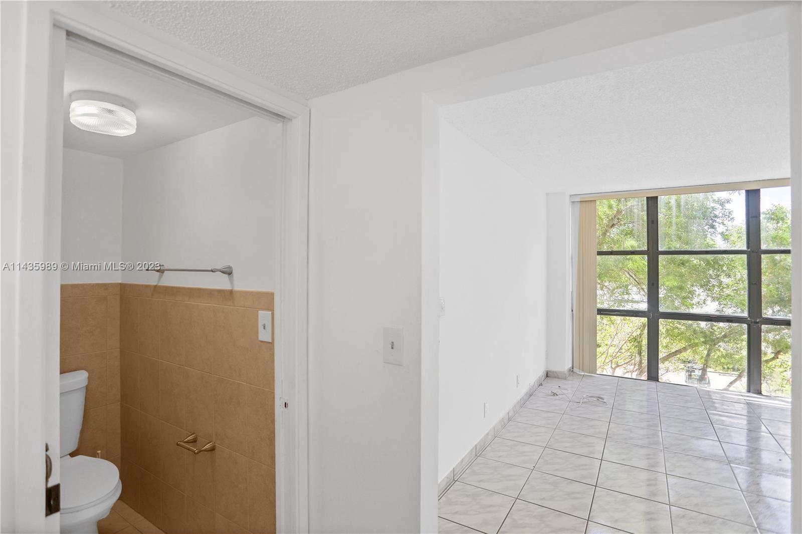 17021 North Bay Road, Unit 418 Sunny Isles Beach, FL 33160 - Photo 14 of 43 a view of an empty room with a window