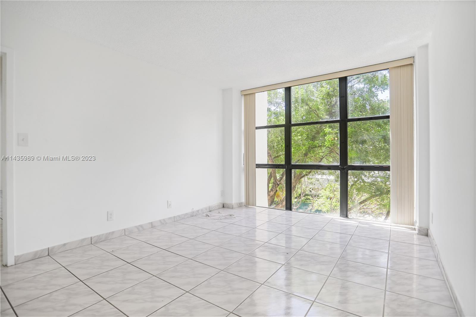 17021 North Bay Road, Unit 418 Sunny Isles Beach, FL 33160 - Photo 16 of 43 a view of room with window