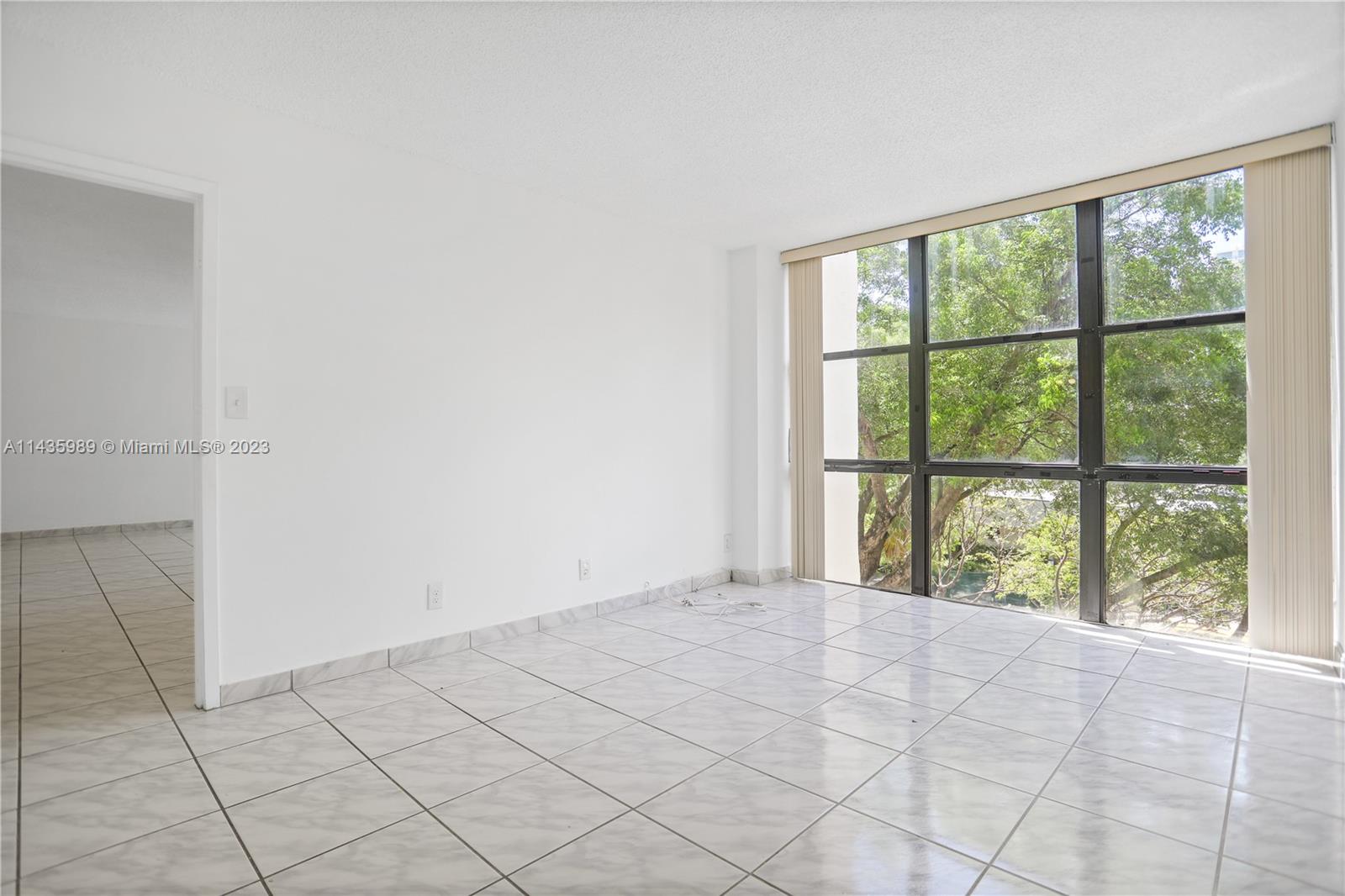17021 North Bay Road, Unit 418 Sunny Isles Beach, FL 33160 - Photo 17 of 43 a view of an empty room and window