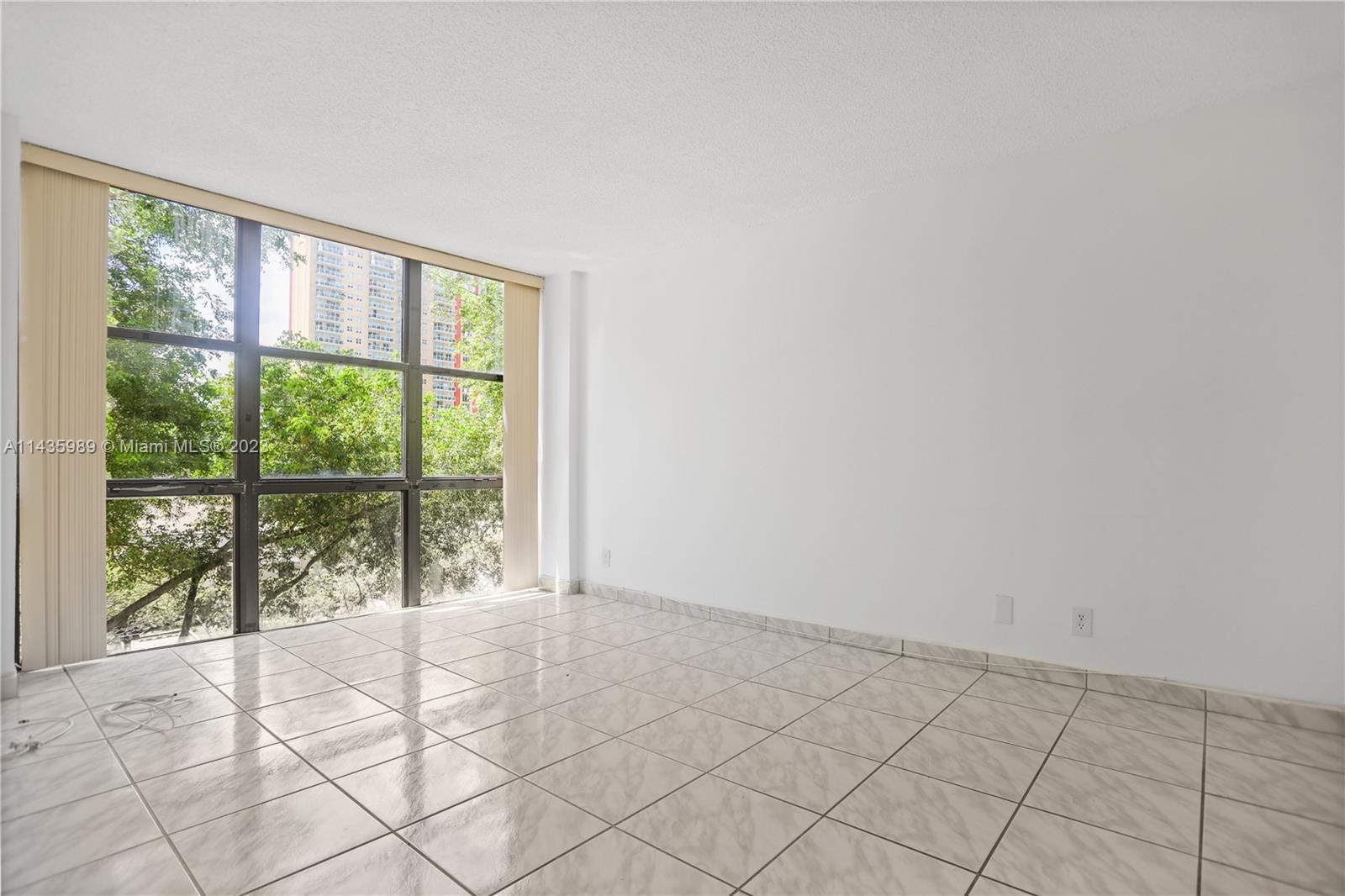 17021 North Bay Road, Unit 418 Sunny Isles Beach, FL 33160 - Photo 19 of 43 a view of an empty room and window