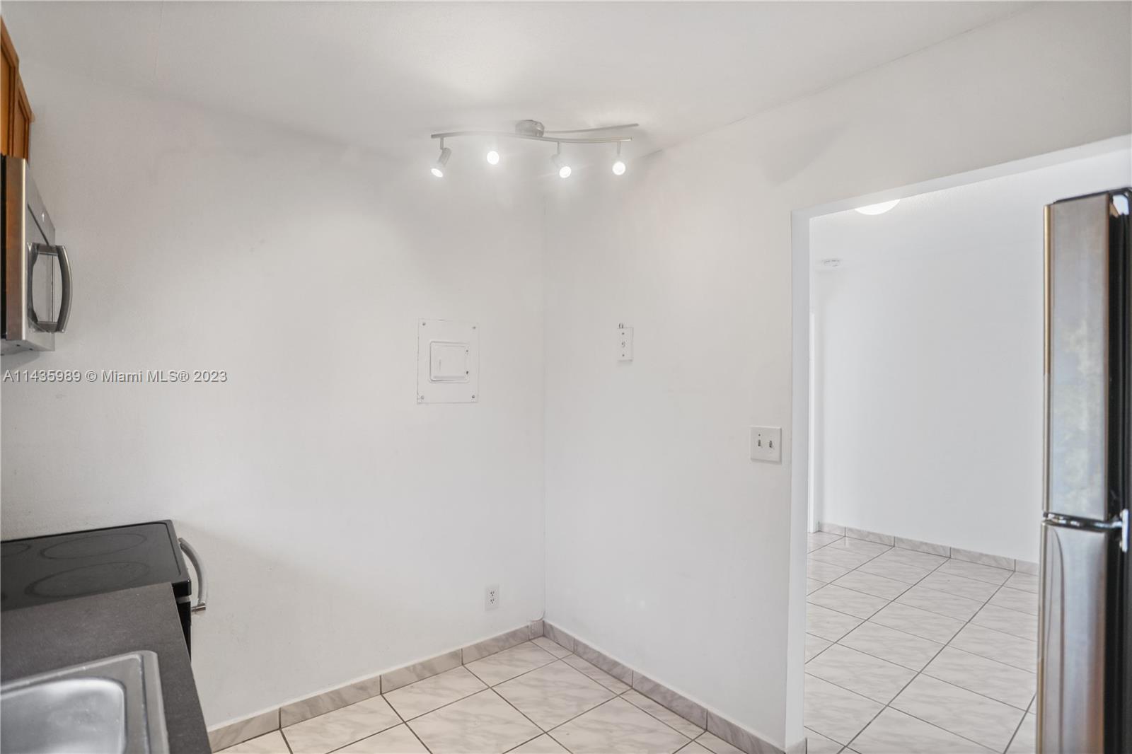 17021 North Bay Road, Unit 418 Sunny Isles Beach, FL 33160 - Photo 20 of 43 a bathroom with a sink and a mirror