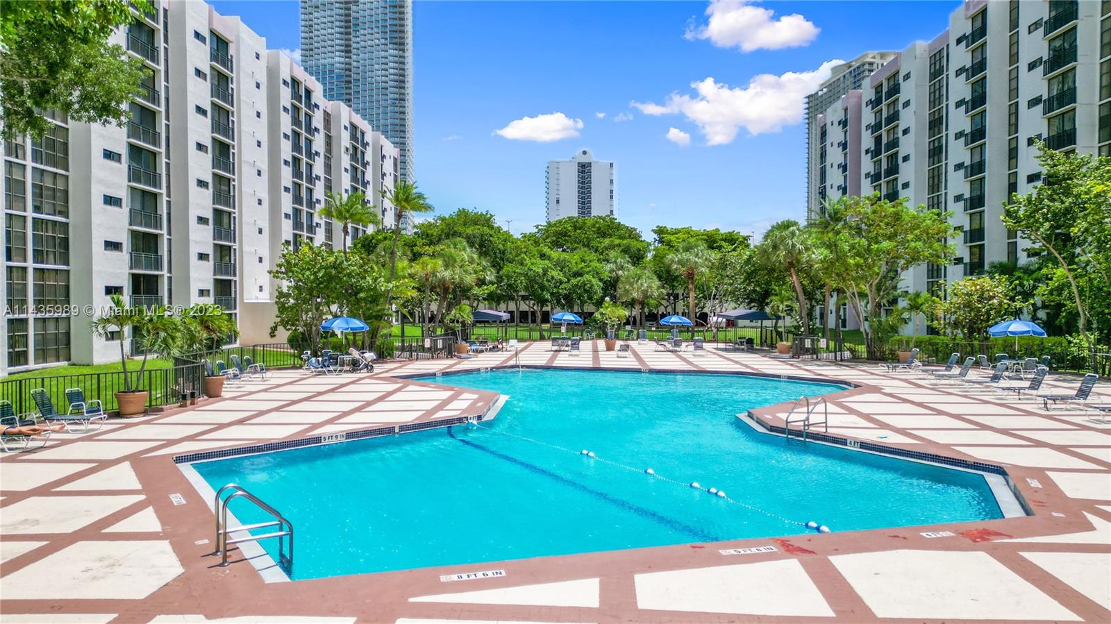 17021 North Bay Road, Unit 418 Sunny Isles Beach, FL 33160 - Photo 34 of 43 a view of a backyard with plants and outdoor seating