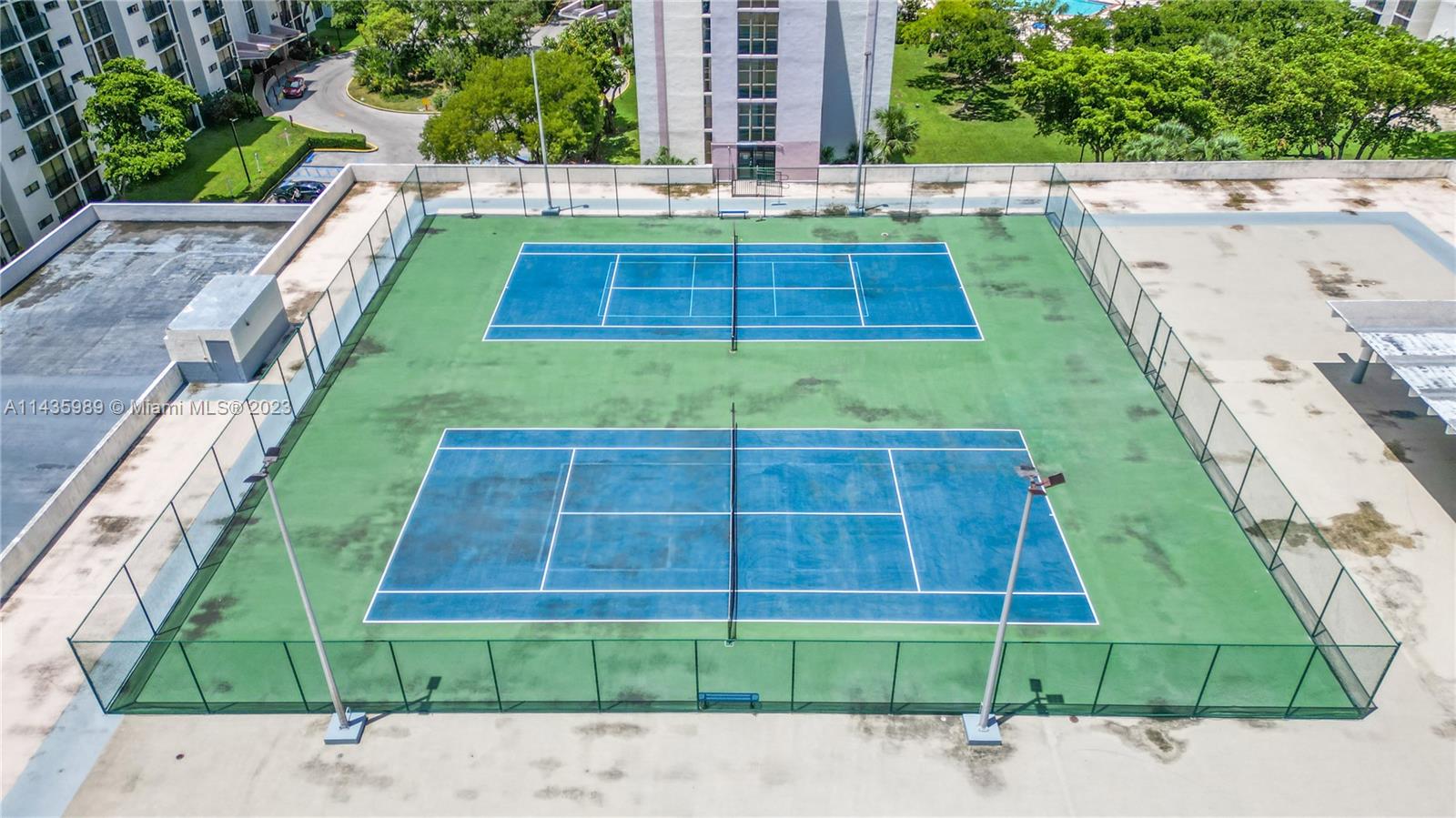 17021 North Bay Road, Unit 418 Sunny Isles Beach, FL 33160 - Photo 40 of 43 a view of a swimming pool with a yard